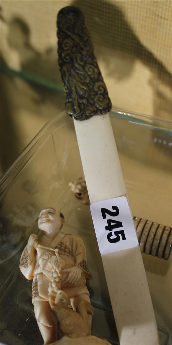 Japanese ivory okimono, similar small figure, paperknife, cylindrical container